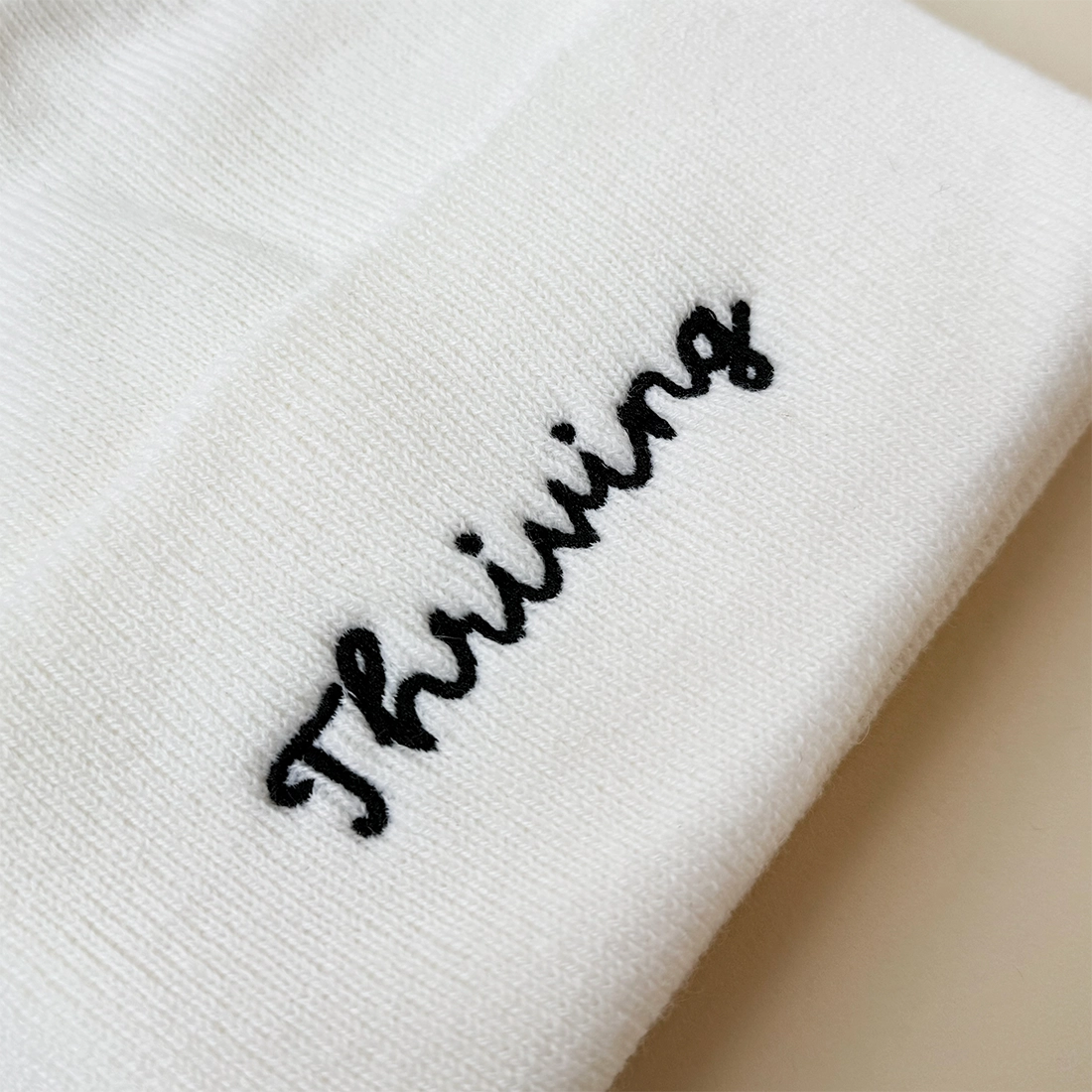 White Embroidered Thriving Beanie